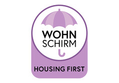 Das Logo von Wohn Schirm - Housing First.